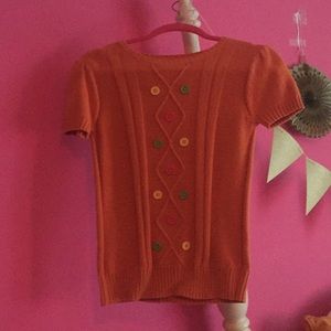 It’s a cute color full button shirt ❤️